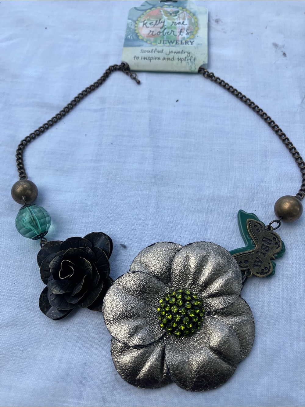 Silver Floral Statement Necklace with Green Accents